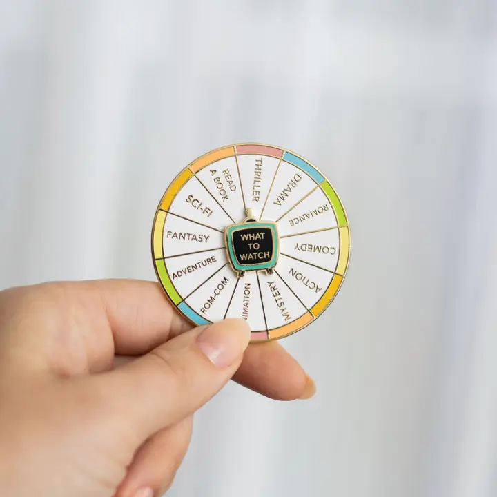 Occasionalish - Spinning What To Watch Enamel Pin